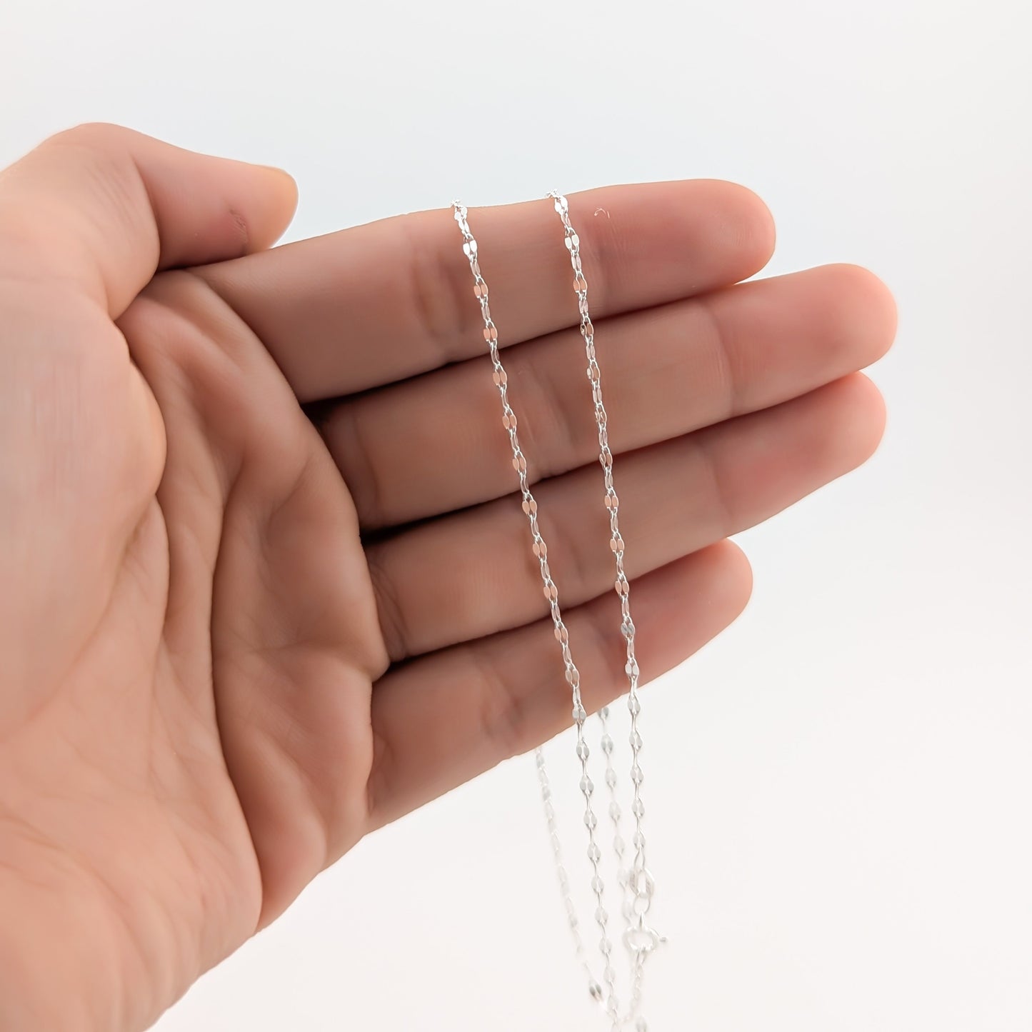 Cadena Singapur bebé